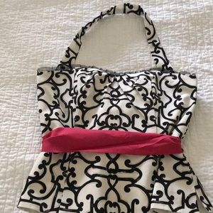 White and black market top size 6 black and white hot pink bow.